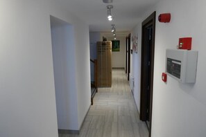 Corridors lead to rooms and amenities.