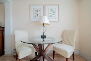 Glass dining table for two
