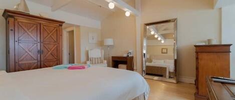 Bedroom angle with mirror and coffee desk