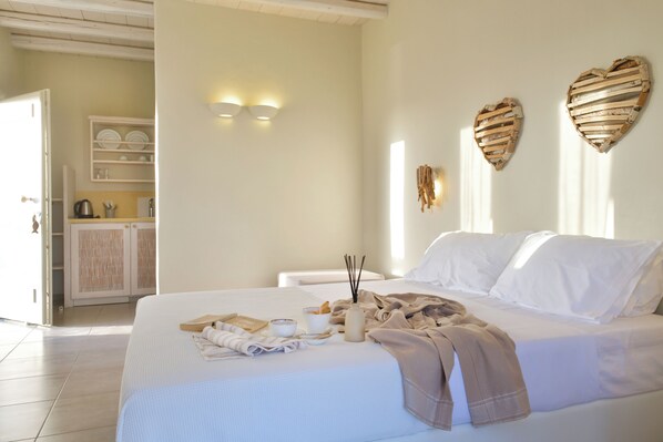 1 quarto, cofres nos quartos, ferros/tábuas de passar roupa