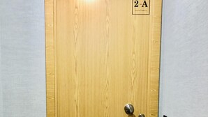 A wooden door with a sign indicating room number 2-A. - Downtown 2A in Oporto (Porto)