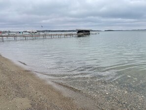 On the beach, sun-loungers, beach towels