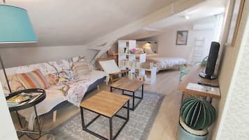 1 bedroom, desk, iron/ironing board, travel crib