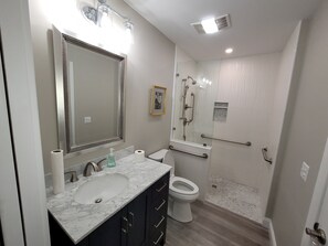 Hair dryer, towels, soap, shampoo