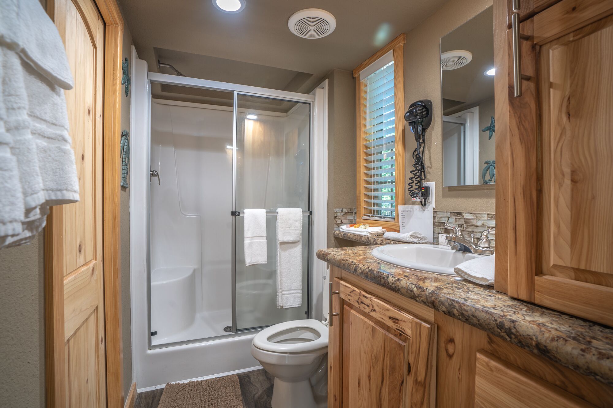 Shower, towels, soap, toilet paper