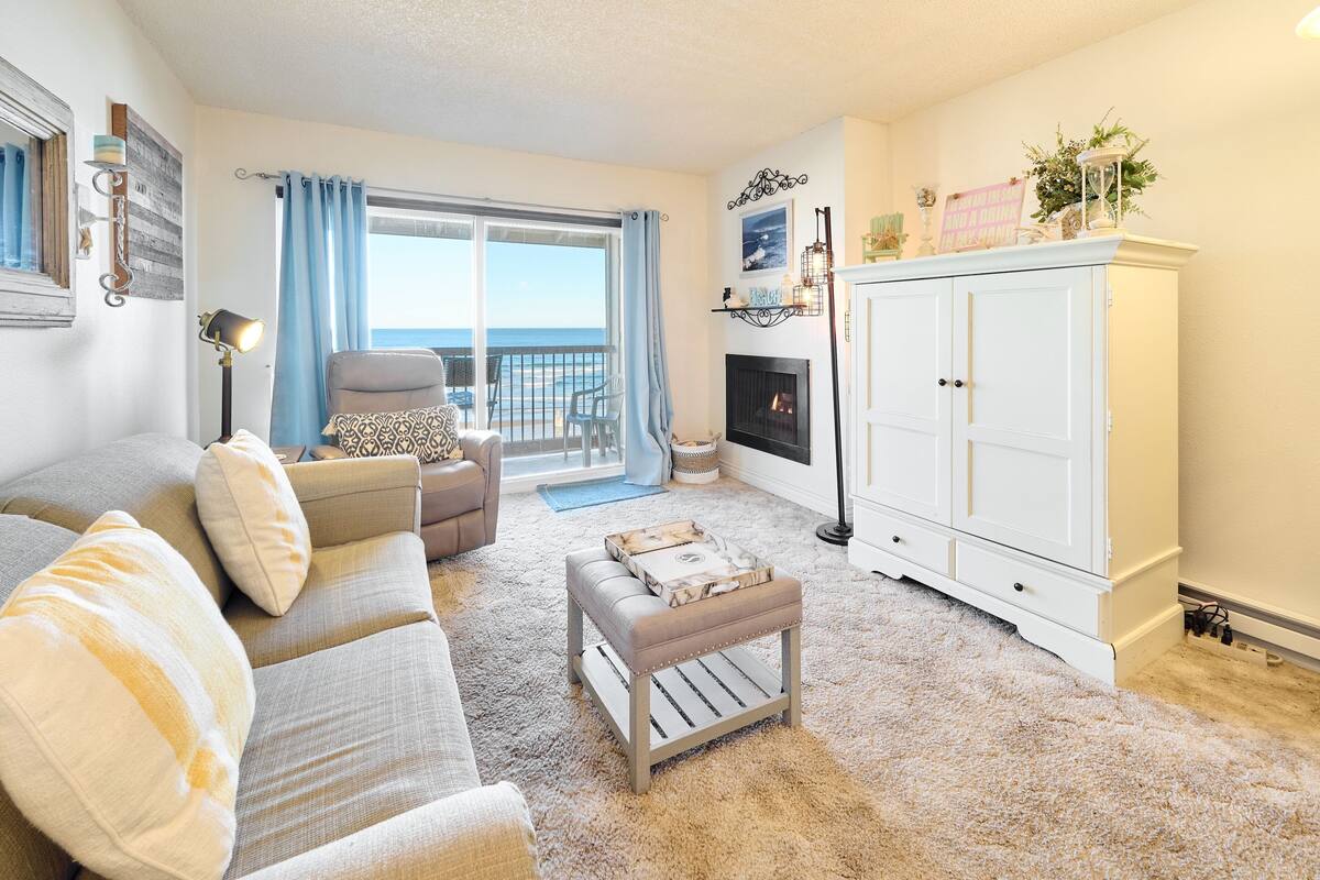 Deluxe Suite, 1 Queen Bed with Sofa bed, Fireplace, Sea View | Living area | Flat-screen TV, DVD player