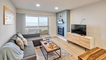 Premier Room, 1 King Bed with Sofa bed, Kitchen, Ocean View | Living area | Flat-screen TV, DVD player