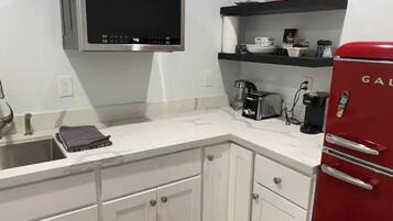 Fridge, microwave, coffee/tea maker, electric kettle