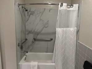 2 QUEEN NON SMOKING- DISABILITY ACCESS | Bathroom | Bathtub, hair dryer, towels, soap
