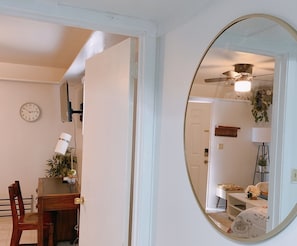 Work in comfort with a desk and chair, plus a convenient clock for keeping track of time.