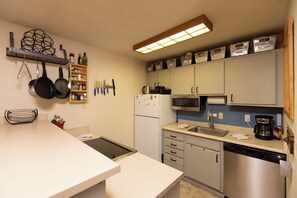 Fridge, microwave, oven, stovetop - Beautiful Two Bedroom Mountain condo with pool, hot tub, gym, and WiFi. (Durango)