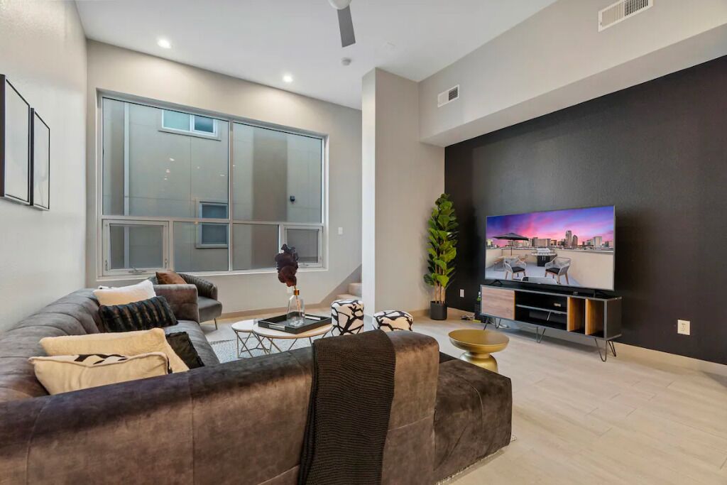 Breathtaking 4 Story Townhome w/ Skyline Views, Space for All! 