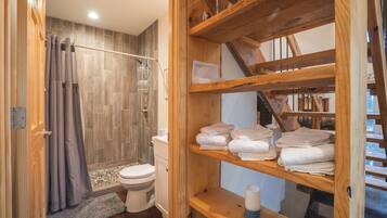 Shower, towels, soap, toilet paper
