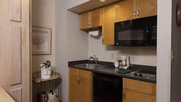 Microwave, coffee/tea maker, toaster, cookware/dishes/utensils