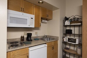 Microwave, coffee/tea maker, toaster, cookware/dishes/utensils