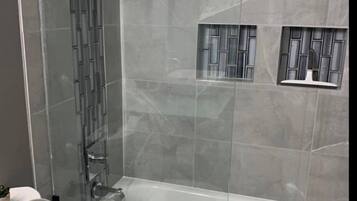 Combined shower/tub, hair dryer