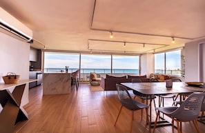 Apartamento Deluxe | Zona de estar