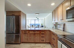 Fridge, microwave, oven, stovetop - Luxury Oceanfront Couples Retreat- Station 1 Top Floor, Newly Renovated (Wrightsville Beach)