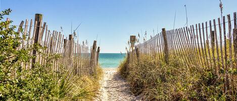 On the beach, sun-loungers, beach towels