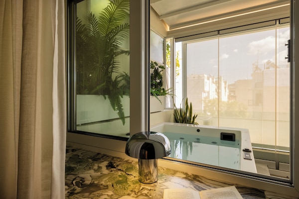 Penthouse Suite with Hot tub | Premium bedding, memory foam beds, in-room safe, individually decorated