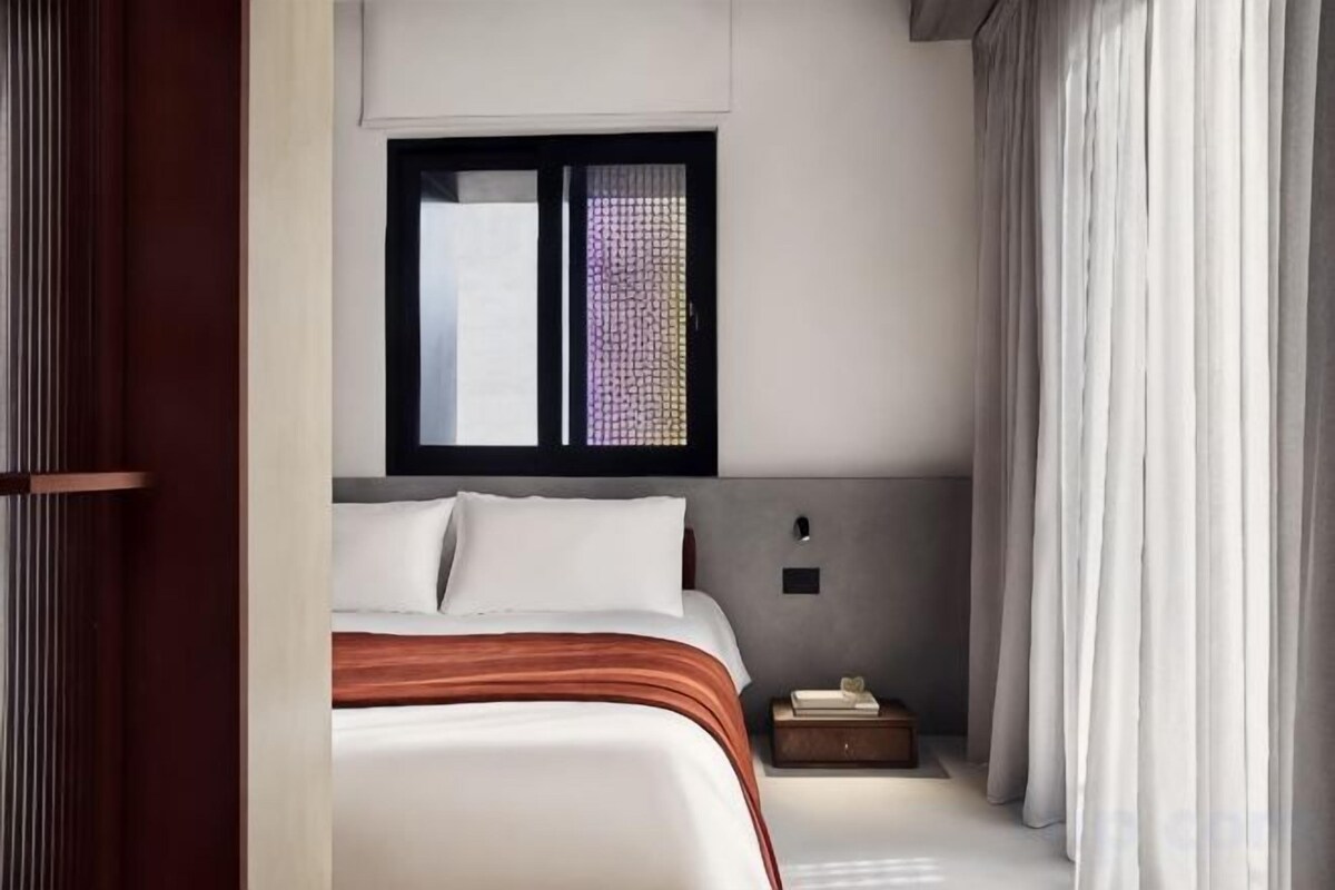 Premium bedding, memory foam beds, in-room safe, blackout drapes