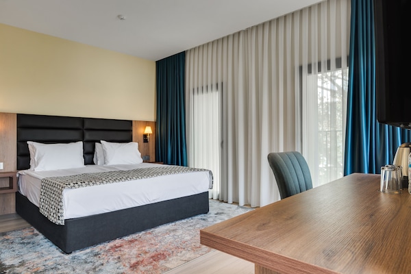 Premium bedding, minibar, in-room safe, desk