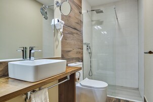 Shower, bathrobes, slippers, bidet