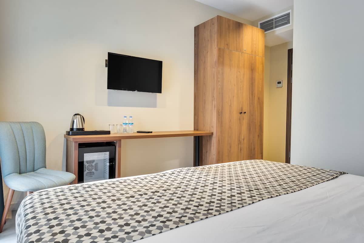 Ropa de cama de alta calidad y minibar