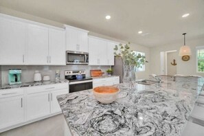 Fridge, microwave, stovetop, dishwasher - Pool Spa Oasis! Chic 6BR Resort Home near Disney (Four Corners)