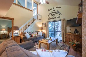 Smart TV, fireplace, books