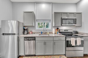 Fridge, microwave, oven, stovetop - Creamery Apartments #10 of 11 Units in Village of Cooperstown Apt Bldg (Cooperstown)