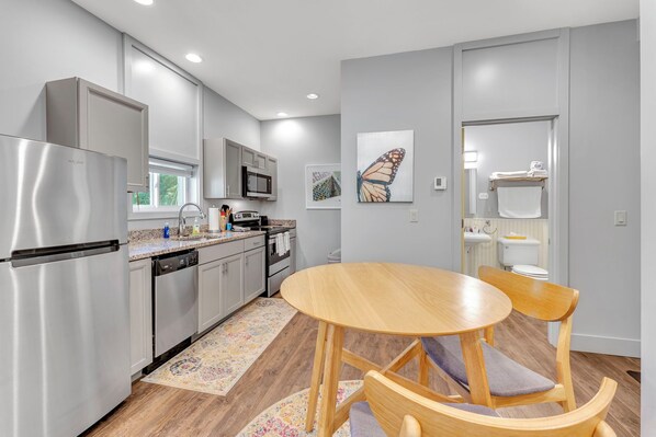 Fridge, microwave, oven, stovetop - Creamery Apartments #10 of 11 Units in Village of Cooperstown Apt Bldg (Cooperstown)