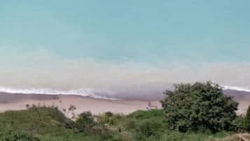 Espreguiçadeiras, toalhas de praia