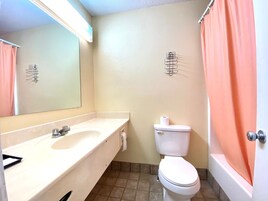 Economy Room | Bathroom | Shower, towels