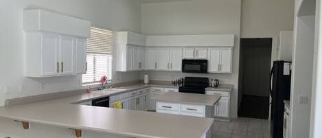 Fridge, microwave, spices, paper towels