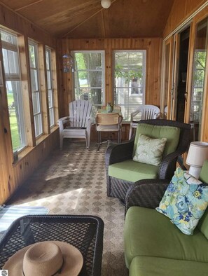 Smart TV, fireplace, books, computer monitors