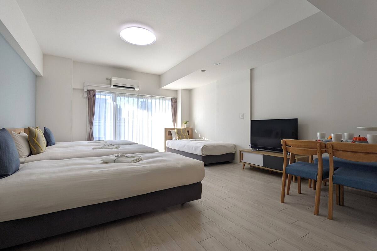 Deluxe Quadruple Room | Premium bedding, blackout drapes, iron/ironing board (on request)