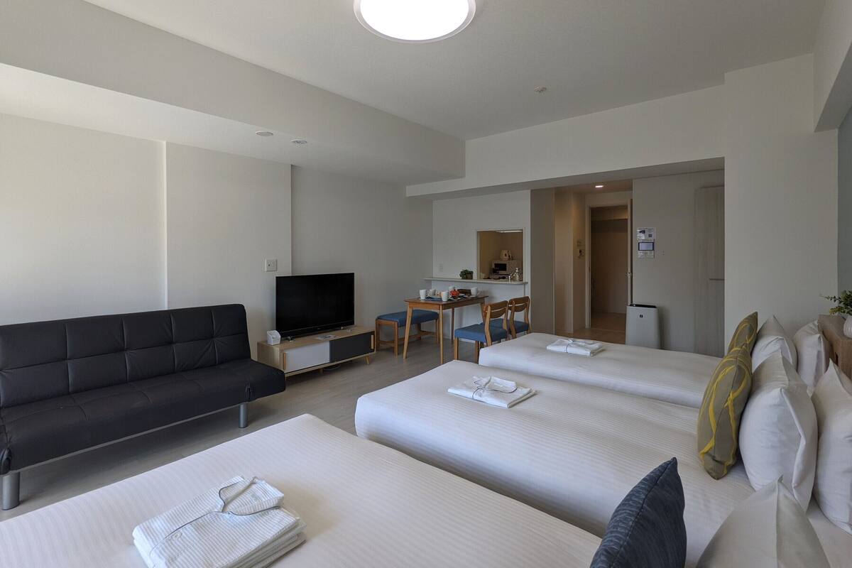 Family Room | Premium bedding, blackout drapes, iron/ironing board (on request)