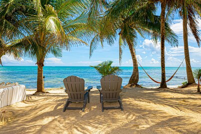 Oceanfront home with beach access, pool, balconies, & waterfront hammocks