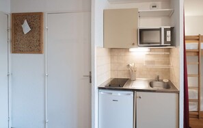 Fridge, toaster, cookware/dishes/utensils