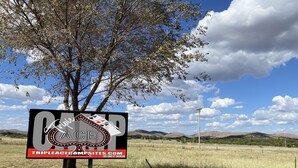 A sign for Triple A Campsites with a tree and a clear sky in the background. - Campsite near Wichita Wildlife Refuge & Mountains (Cache)