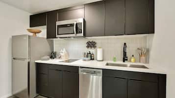 Microwave, stovetop, coffee/tea maker, cookware/dishes/utensils