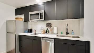 Microwave, stovetop, coffee/tea maker, cookware/dishes/utensils