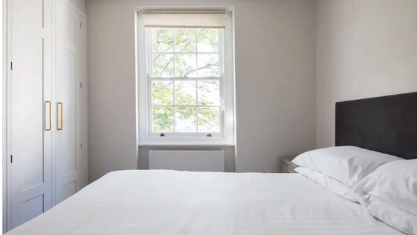 2 dormitorios, tabla de planchar con plancha, wifi gratis y ropa de cama