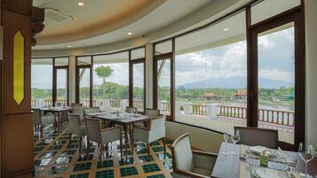 Breakfast, dinner served; international cuisine, garden views