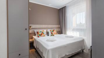 1 habitación, tabla de planchar con plancha, wifi y ropa de cama