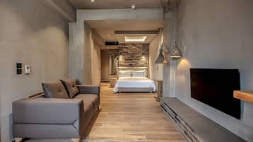 Premium-suite - stueetage | 1 soveværelse, premium-sengetøj, dundyner, senge med topmadrasser