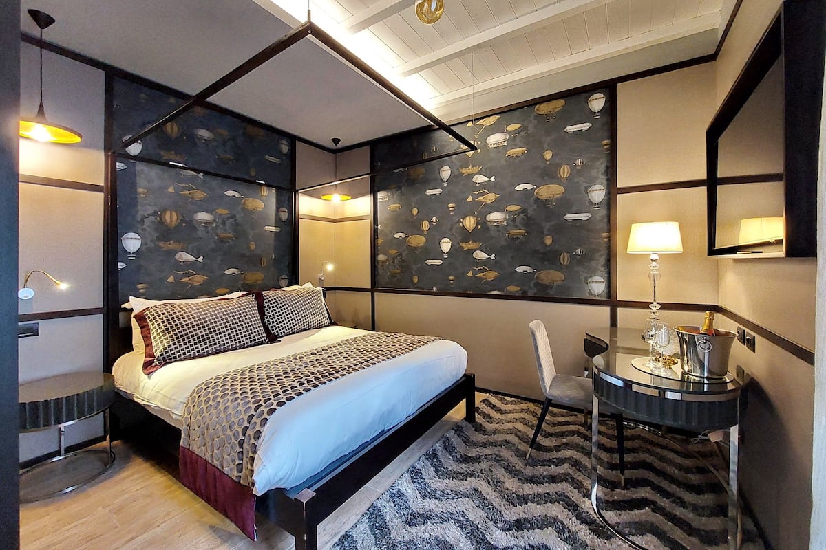 Superior Room | Minibar, in-room safe, individually decorated, individually furnished