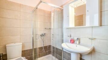 Shower, free toiletries, hair dryer, towels