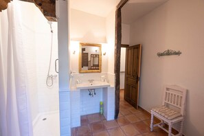 Bathtub, hair dryer, towels, soap